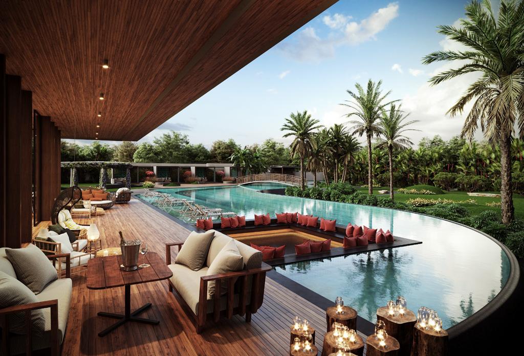 Resort-style pool deck with lounge seating